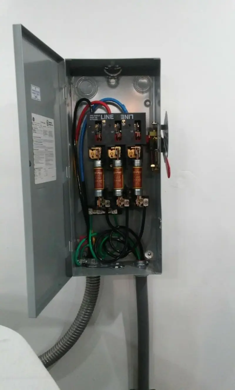 Three-phase disconnect switch installed for Electrical Wiring & Rewiring in Delhi